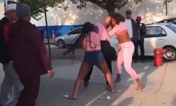 Fat woman being beaten by two women in cowardice.