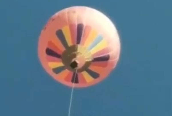 Man falls to the death from his own balloon.