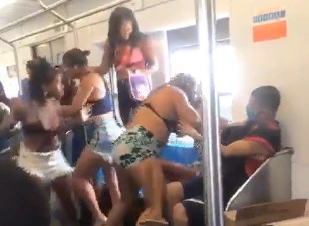 Women fighting on the subway in Brazil.