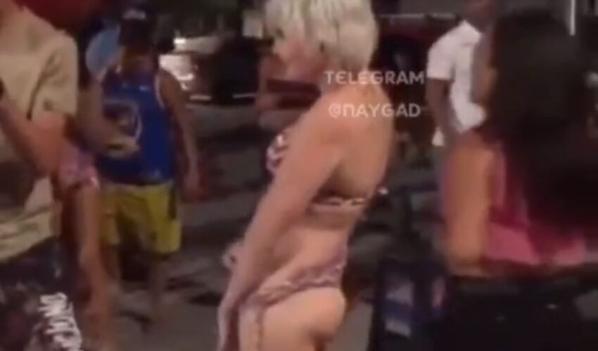 Tranny shows genital to man at party and gets punched in the face in Brazil.