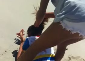 Girl being stabbed to death on the beach in Brazil by two women.