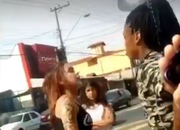 Girls fighting savagely in the middle of the street in Brazil.