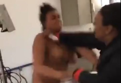 Woman fighting with patient in medical office.