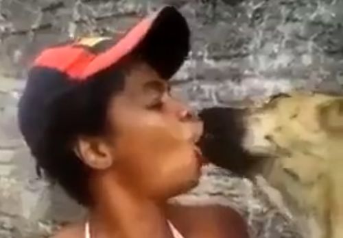 Guys, this is disgusting! She is kissing the dog on the mouth!