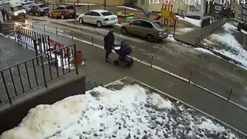 Man jumps to suicide and falls on baby carriage.