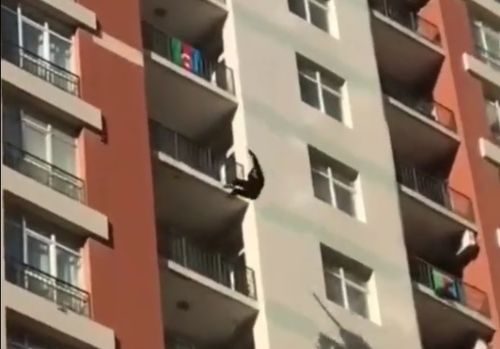 Woman throws herself off a building and the sound is terrible.