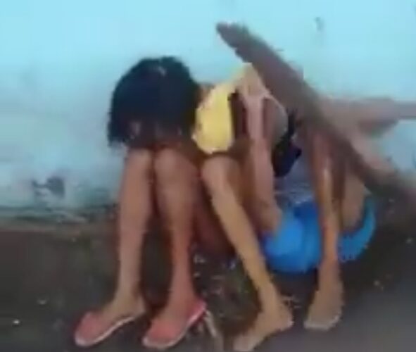 Young couple being beaten with sticks in Brazil.