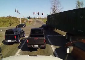 A traffic accident with a truck is filmed.