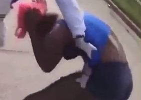 Man beating woman in public.