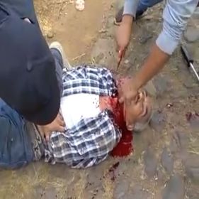 Man being brutally beheaded by a cartel in Mexico.
