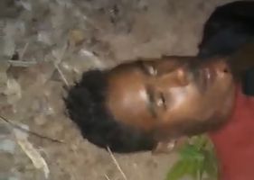 Man being brutally murdered and slowly beheaded with a machete in Brazil.