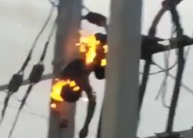 Man on fire after suffering a deadly electric shock.