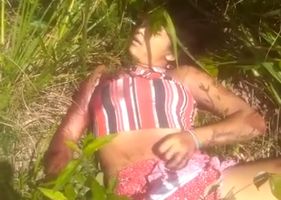 The body of a dead woman is found in the bush in Brazil.