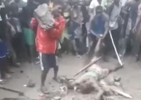 Dude stoned to death in heavy rain in Africa.