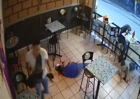 Brutal execution in a cafeteria in broad daylight.