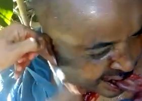 Man has his ears cut off with a kitchen knife and is forced to eat his own ear.