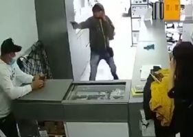 Store attendant is shot several times in an attempted execution in Bogotá, Colombia.