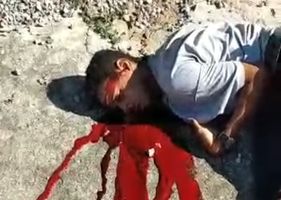 Two men are executed in broad daylight with headshots in Brazil.