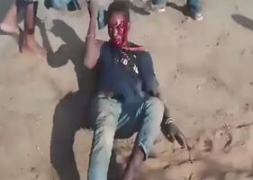 Alleged thief being savagely beaten by villagers who want to take justice into their own hands.