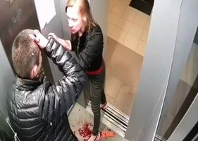 Couple fighting violently with lots of blood inside elevator in Russia.