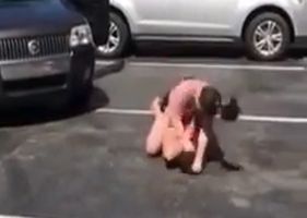 Girls fighting after one of them tries to run over the other twice with a car.