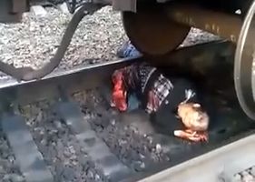 Man is hit by train and loses both legs.