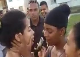 Female teenager being beaten as punishment in a condominium in Brazil.