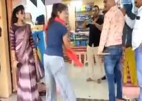 Woman beats a man with a piece of stick and is miserable beaten as punishment.