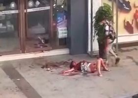 Woman being brutally stabbed in public in China.