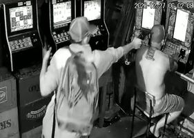 Man playing in nickel machine is cowardly shot to the head in the back.