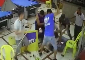 Thief breaks into the bar to steal, customers react and he is beaten and skewered to the end.
