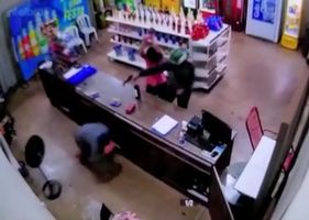 Store attendant being shot at work in Brazil.