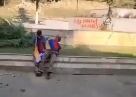 Azerbaijan soldiers execute Armenia prisoners.