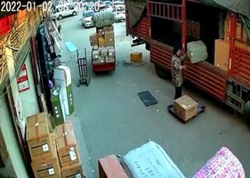 Something explodes (maybe a bomb) during truck unloading and worker dies in China.