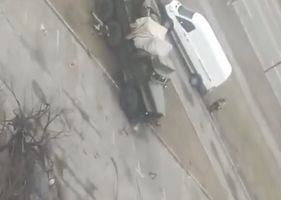 Russian soldiers are ambushed in a parking lot in Kiev, Ukraine. All three (3) Russian soldiers were killed.