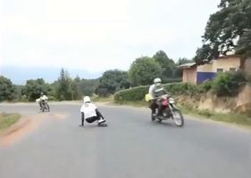 Skate boy hit by a big motorcycle Photo 0001