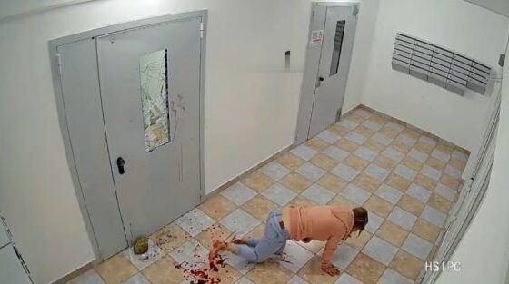 Apparently drunk woman bleeding while trying to break down the door by breaking the glass Photo 0001 Video Thumb
