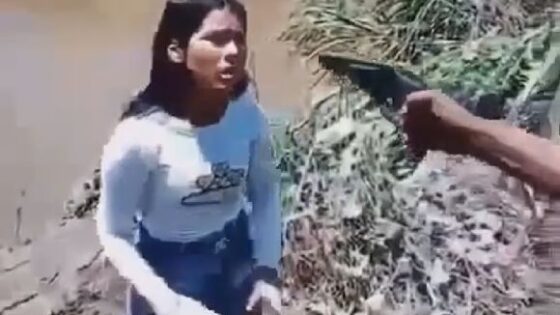 Woman shot to the head near a lake in a latin american country Photo 0001 Video Thumb